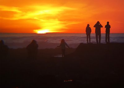 People Watching Mavericks Sunset at Low Tide