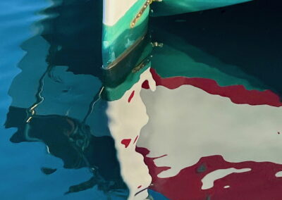 Rippling Reflections with A Splash of Red