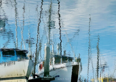 Boat Reflections at Pillar Point harbor